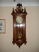 A walnut Vienna wall clock