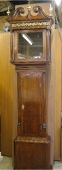 An oak longcase clock